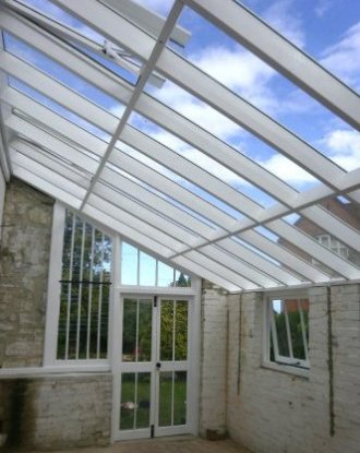 Bespoke Joinery From fitted shelving to matching in panelling around a window in a listed building