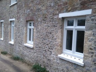 builders east devon listed buildings